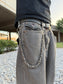 SKULL-BOUND CHAIN BELT