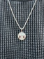 VITRUVIAN MAN NECKLACE